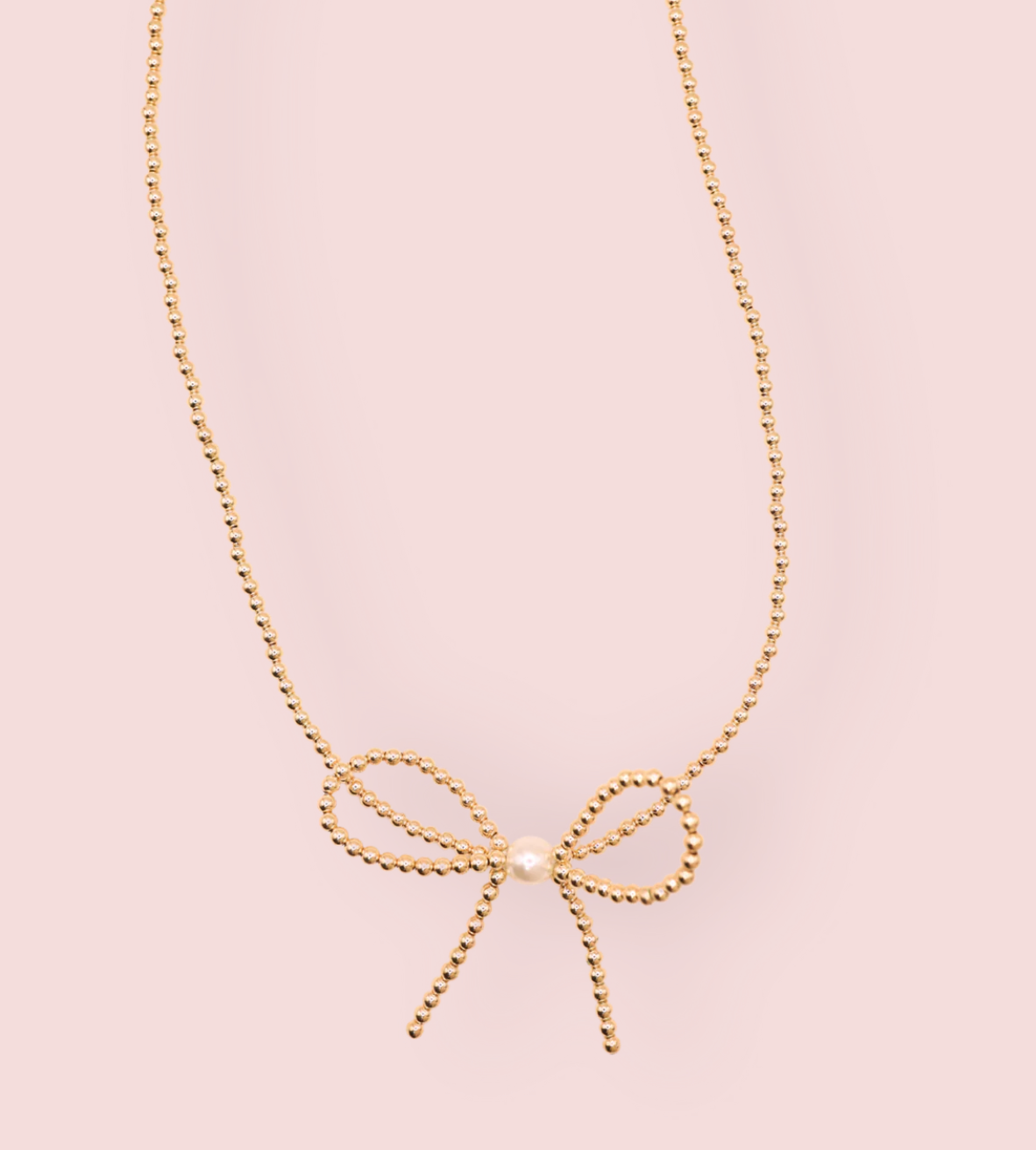 GOLD BOW NECKLACE
