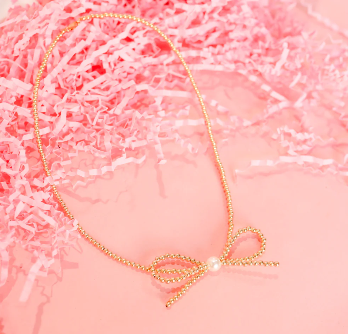 GOLD BOW NECKLACE