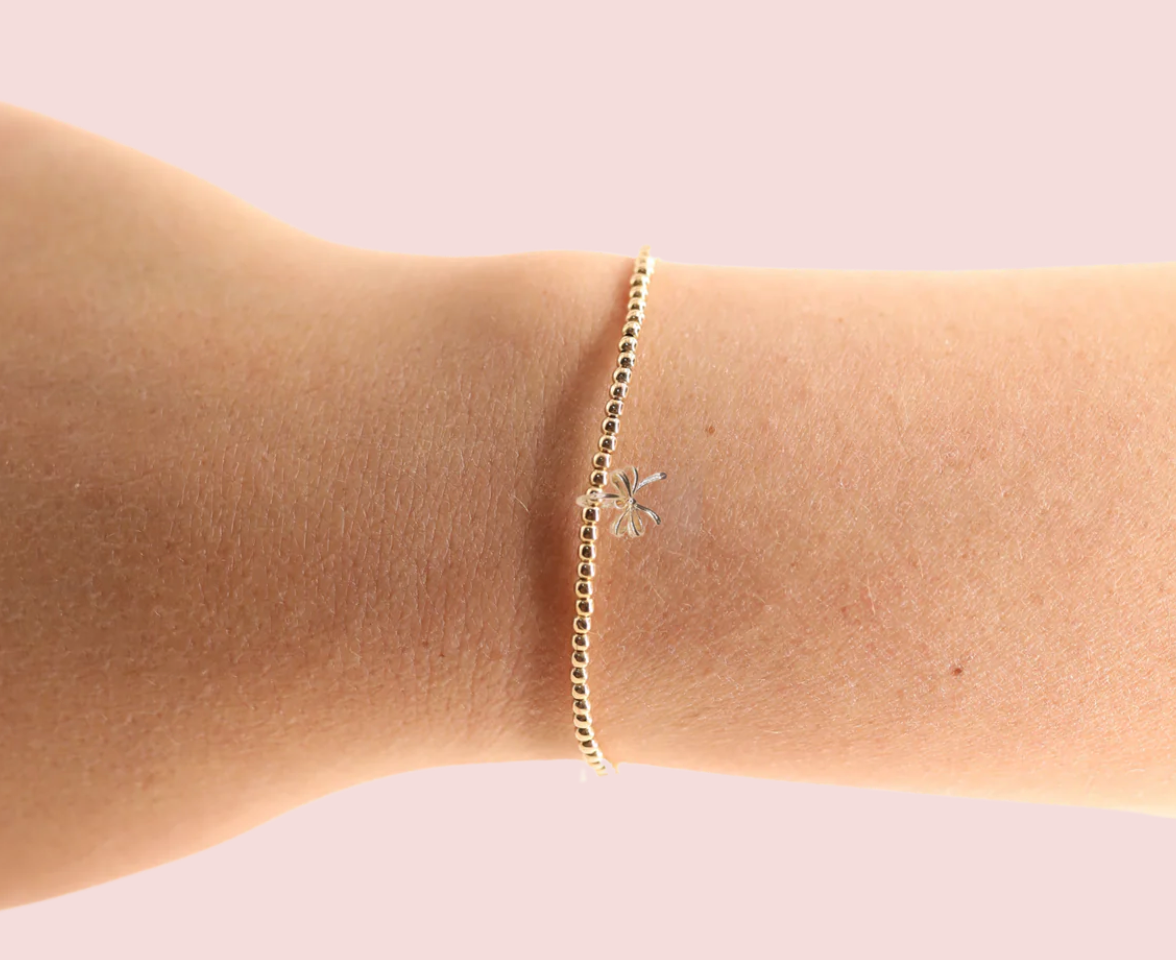 GOLD BOW BEADED BRACELET